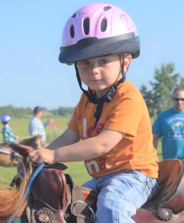 NEVER TOO YOUNG TO GET ON A HORSE!